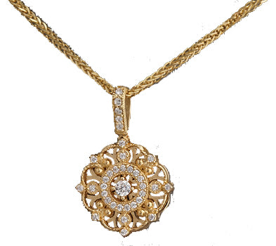 14K gold shield pendant is a celebration of elegance.